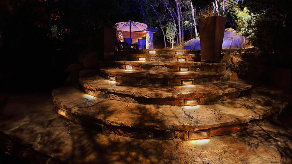 How To Incorporate Landscape Lighting Into Your Concrete Hardscape